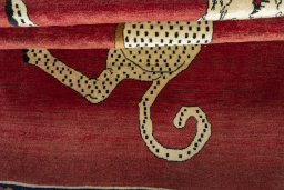 Full view of 2000s Persian Gabbeh rug from Iran / Persia, 207 × 132 cm in Red tones