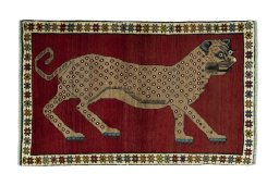 Full view of 2000s Persian Gabbeh rug from Iran / Persia, 167 × 104 cm in Red tones