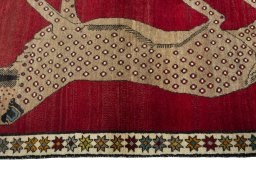 Close-up detail of 2000s Persian Gabbeh rug from Iran / Persia showing Wool weave