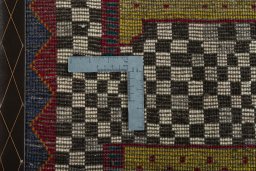 Close-up detail of 2000s Persian Gabbeh rug from Iran / Persia showing Wool weave