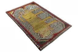 Close-up detail of 2000s Persian Gabbeh rug from Iran / Persia showing Wool weave