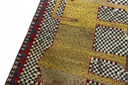 Backside of handmade 2000s Persian Gabbeh rug showing knot structure and weave density
