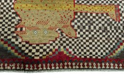 Central medallion detail of 2000s Persian Gabbeh rug from Iran / Persia