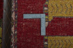 Close-up detail of 2000s Persian Gabbeh rug from Iran / Persia showing Wool weave