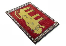 Close-up detail of 2000s Persian Gabbeh rug from Iran / Persia showing Wool weave