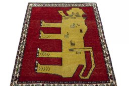 Surface texture of 2000s Persian Gabbeh rug with natural Wool and intricate pattern