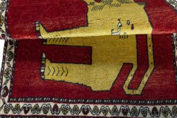 Full view of 2000s Persian Gabbeh rug from Iran / Persia, 123 × 88 cm in Red tones