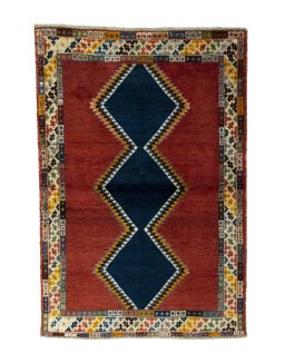 Full view of 2000s Persian Gabbeh rug from Iran / Persia, 150 × 102 cm in Red tones