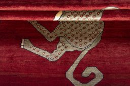Full view of 2000s Persian Gabbeh rug from Iran / Persia, 193 × 140 cm in Red tones