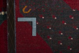 Close-up detail of 2000s Persian Gabbeh rug from Iran / Persia showing Wool weave