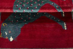 Full view of 2000s Persian Gabbeh rug from Iran / Persia, 154 × 101 cm in Red tones