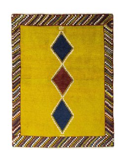 Full view of 2000s Persian Gabbeh rug from Iran / Persia, 140 × 106 cm in Yellow tones