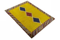 Close-up detail of 2000s Persian Gabbeh rug from Iran / Persia showing Wool weave