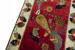 Backside of handmade 2000s Persian Gabbeh rug showing knot structure and weave density