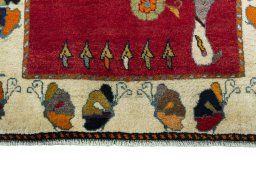 Central medallion detail of 2000s Persian Gabbeh rug from Iran / Persia