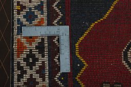Close-up detail of 2000s Persian Gabbeh rug from Iran / Persia showing Wool weave