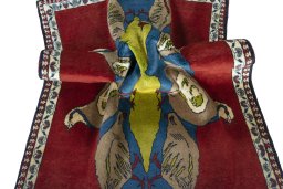 Corner detail of 2000s Persian Gabbeh rug showing border pattern and Wool pile