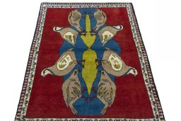 Surface texture of 2000s Persian Gabbeh rug with natural Wool and intricate pattern