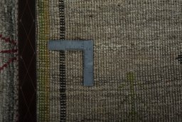 Close-up detail of 2000s Persian Gabbeh rug from Iran / Persia showing Wool weave