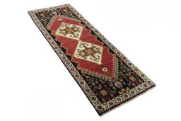 Close-up detail of 2000s Persian Gabbeh rug from Iran / Persia showing Wool weave