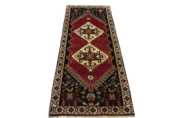 Surface texture of 2000s Persian Gabbeh rug with natural Wool and intricate pattern