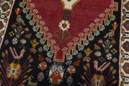 Central medallion detail of 2000s Persian Gabbeh rug from Iran / Persia
