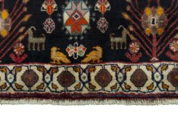 Close-up detail of 2000s Persian Gabbeh rug from Iran / Persia showing Wool weave