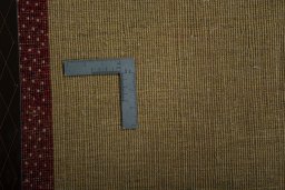 Corner detail of New Persian Gabbeh rug showing border pattern and Wool pile
