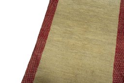 Backside of handmade New Persian Gabbeh rug showing knot structure and weave density