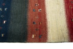 Close-up detail of 2000s Persian Gabbeh rug from Iran / Persia showing Wool weave