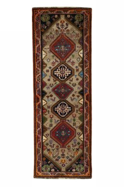 Full view of 2000s Persian Gabbeh rug from Iran / Persia, 243 × 84 cm in Beige tones