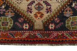 Central medallion detail of 2000s Persian Gabbeh rug from Iran / Persia