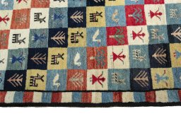 Close-up detail of 2000s Persian Gabbeh rug from Iran / Persia showing Wool weave