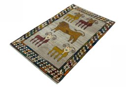 Corner detail of 2000s Persian Gabbeh rug showing border pattern and Wool pile