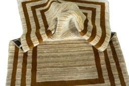 Corner detail of 2000s Persian Gabbeh rug showing border pattern and Wool pile