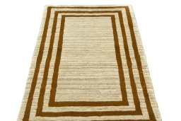 Surface texture of 2000s Persian Gabbeh rug with natural Wool and intricate pattern