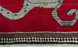 Central medallion detail of 2000s Persian Gabbeh rug from Iran / Persia