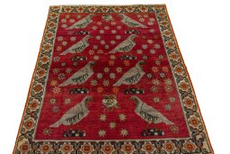 Surface texture of 2000s Persian Gabbeh rug with natural Wool and intricate pattern