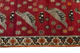 Close-up detail of 2000s Persian Gabbeh rug from Iran / Persia showing Wool weave