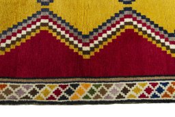 Close-up detail of 2000s Persian Gabbeh rug from Iran / Persia showing Wool weave