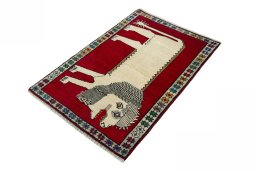 Corner detail of 2000s Persian Gabbeh rug showing border pattern and Wool pile