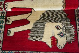 Full view of 2000s Persian Gabbeh rug from Iran / Persia, 150 × 101 cm in Red tones