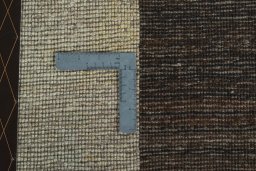 Close-up detail of 2000s Persian Gabbeh rug from Iran / Persia showing Wool weave