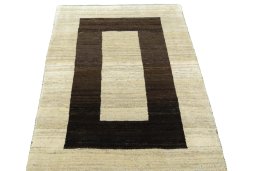 Surface texture of 2000s Persian Gabbeh rug with natural Wool and intricate pattern