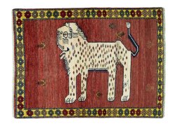 Full view of 2000s Persian Gabbeh rug from Iran / Persia, 135 × 100 cm in Red tones