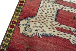 Backside of handmade 2000s Persian Gabbeh rug showing knot structure and weave density