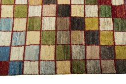 Close-up detail of 2000s Persian Gabbeh rug from Iran / Persia showing Wool weave