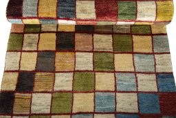 Full view of 2000s Persian Gabbeh rug from Iran / Persia, 195 × 91 cm in Multi Color tones