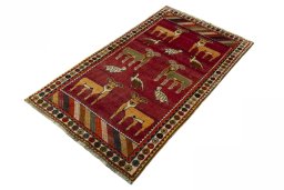 Corner detail of 2000s Persian Gabbeh rug showing border pattern and Wool pile
