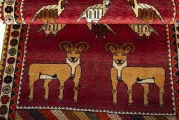 Full view of 2000s Persian Gabbeh rug from Iran / Persia, 189 × 107 cm in Red tones